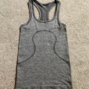 Sparkly lululemon swiftly tank top.